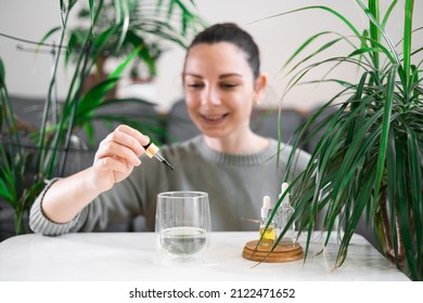 Woman Drinking Glass With Chlorophyll Water, Antioxidant Beverage. Healthy Lifestyle 