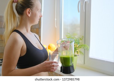 Woman Drinking Green Detox Smoothie