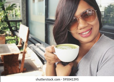 Woman Drinking Green Tea And Milk