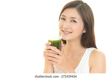 Woman Drinking Vegetable Juice