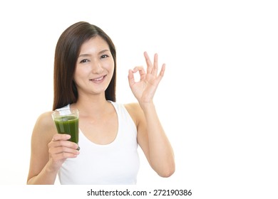 Woman Drinking Vegetable Juice