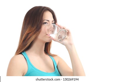 Woman Drinking Water From A Glass On A White Isolated Background