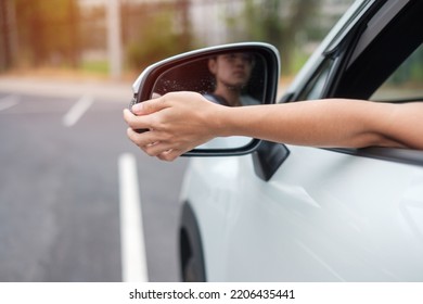 Woman Driver Adjusting Side View Mirror A Car. Journey, Trip And Safety Transportation Concepts