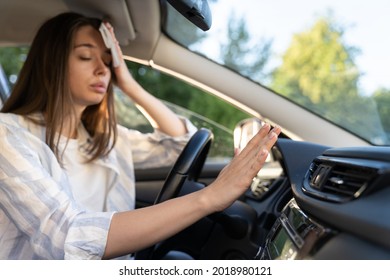 Woman Driver Has Problem With A Non-working Conditioner, Hand Checking Flow Cold Air, Being Hot During Heat Wave In Car, Suffering From Summer Hot Weather, Wipes Sweat From Her Forehead With Tissue. 