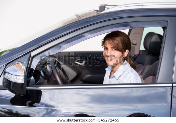 Woman drives the\
car