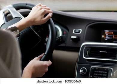 Woman Driving A Car