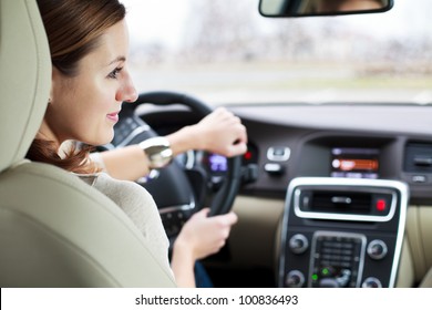 Woman Driving A Car