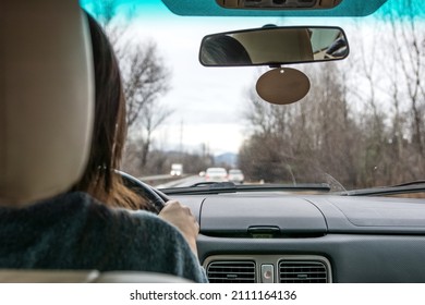 A Woman Driving A Car.
Anonymous Woman Inside A Car.