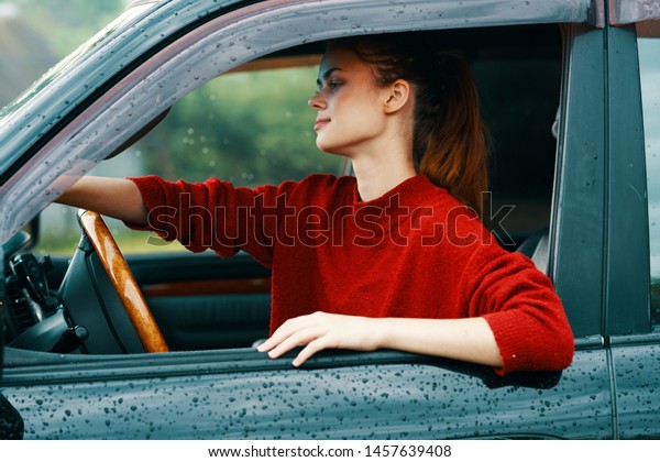 Woman driving car driving countryside countryside \
trip rest nature