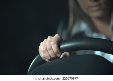 Woman Driving A Car Late At Night, Hands On Steering Wheel Close-up.