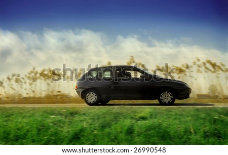 woman driving a car in the nature