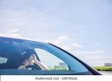 Girl Revving Car