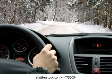 Woman Driving A Car In Winter