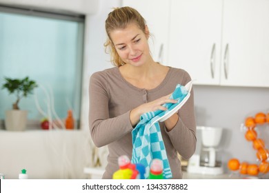 Woman Drying Dishes