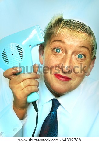 Woman drying her hair blonde