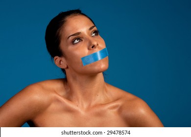 Woman With A Duct Tape Over Her Mouth