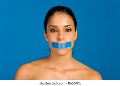 Woman With A Duct Tape Over Her Mouth