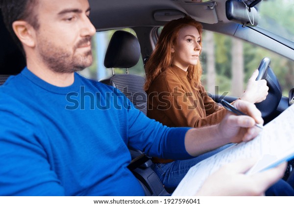 Woman during
driving school license
examination