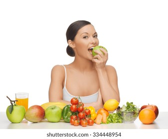 Woman Eating Apple With Lot Of Fruits And Vegetables