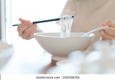  Woman Eating Asian Food Beef And Meat Ball Noodle Soup