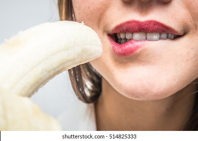 Woman Eating Banana