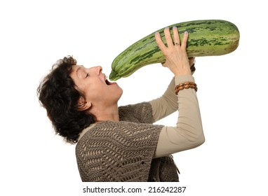 Woman Eating Big Courgette (zucchini)