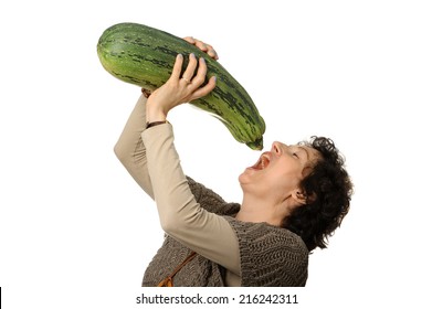 Woman Eating Big Courgette (zucchini)