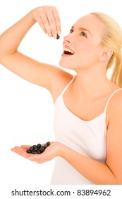 Woman Eating Blueberries