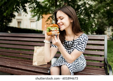 Woman Eating Burger