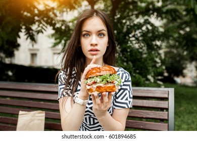 Woman Eating Burger