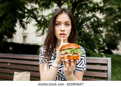 Woman Eating Burger