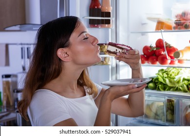 Woman Eating Cake