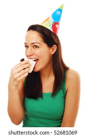 Woman Eating Cake Wearing Party Hat