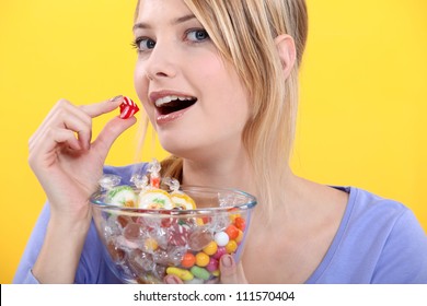 Woman Eating Candy