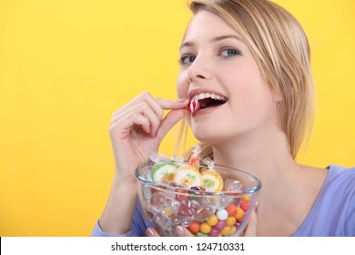 Woman Eating Candy