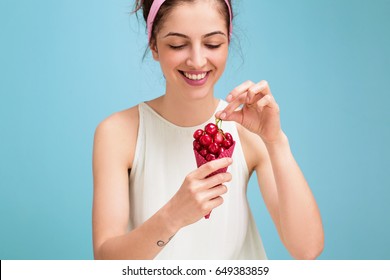 Woman Eating Cherries 