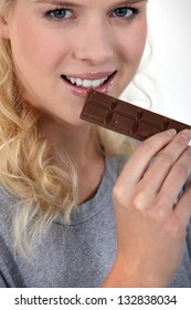 Woman Eating Chocolate