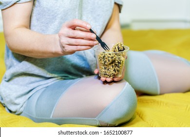 Woman Eating Chocolate Rum Balls