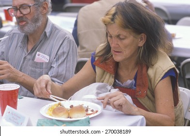 Woman Eating Christmas Dinner At Homeless Shelter, Los Angeles, California