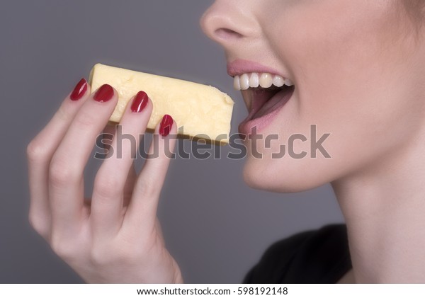 Woman Eating Chunk Cheese Stock Photo Edit Now