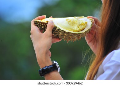 Woman Eating Durian