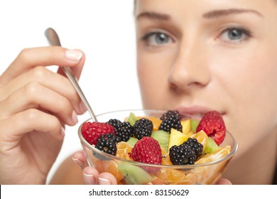 Woman Eating Fruit Salad