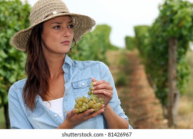 Woman Eating Grapes