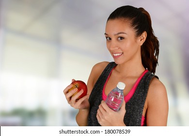 Woman Eating Healthy Food After A Workout