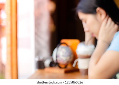woman eating iced coffee and  rotate Vintage Style World Globe on wood table,19 november 2018,Ubonratchatani ,Thailand.
 - Shutterstock ID 1235865826