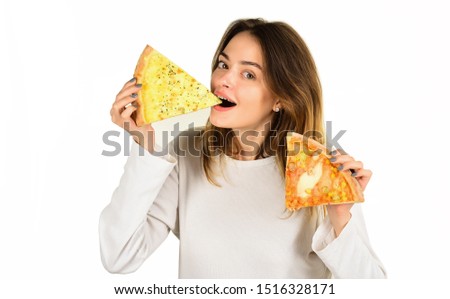Woman eating pizza. Smiling woman eat pizza. Food. Lunch. Happy girl holding pizza slices in hands. Fastfood. Snack. Food delivery. Copy space. Pizza slice.