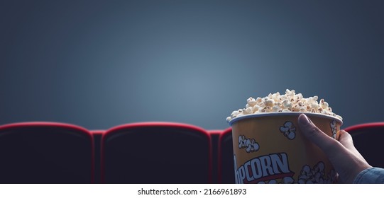 Woman Eating Popcorn At The Movie Theater, POV Shot, Blank Copy Space