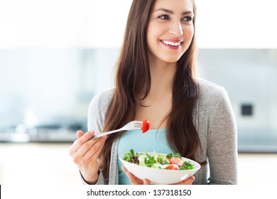 Woman Eating Salad