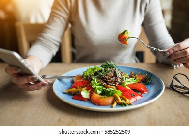 Woman Eating Salad 