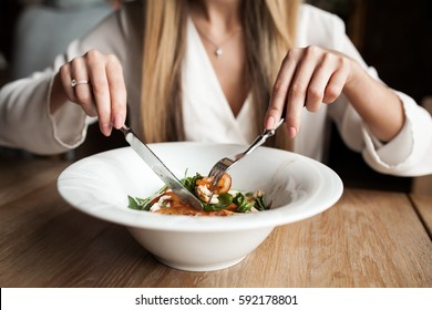 Woman Eating Salad